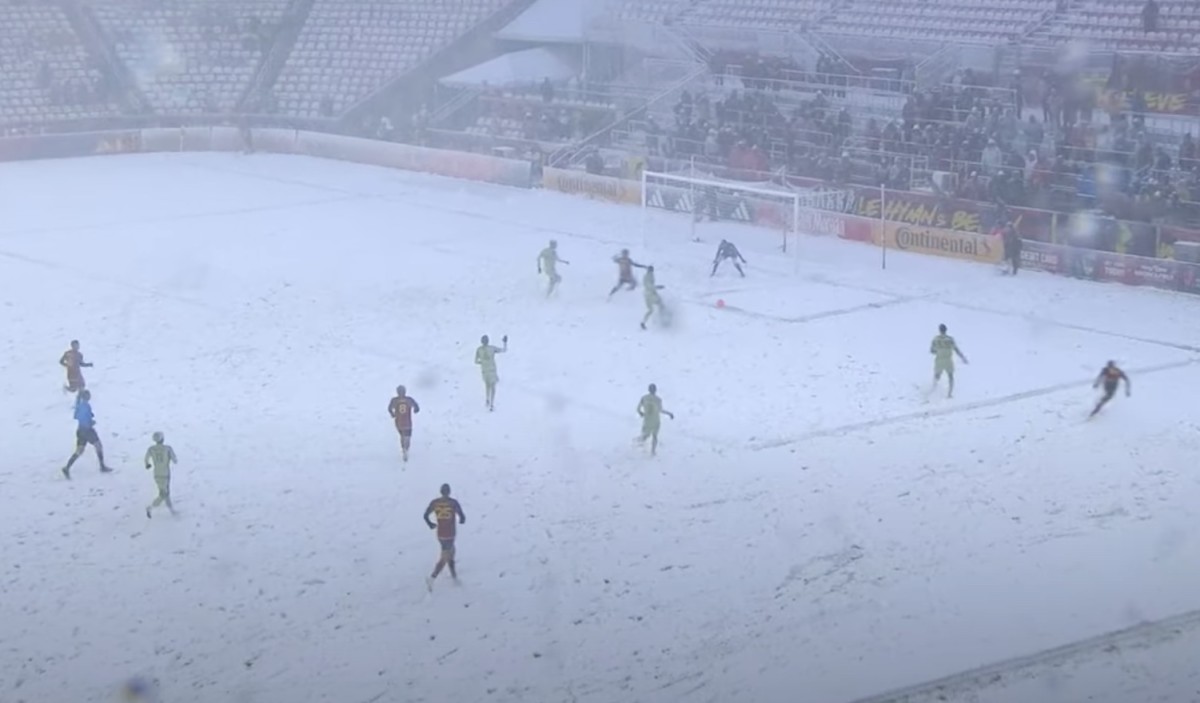 An action shot taken during Real Salt Lake's 3-0 win over LAFC in Major League Soccer on a snow-covered pitch in March 2024